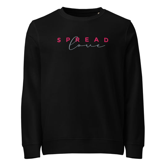A black crewneck sweatshirt featuring the text 'SPREAD love' printed across the chest, with 'SPREAD' in pink block letters and 'love' in a light blue cursive script.