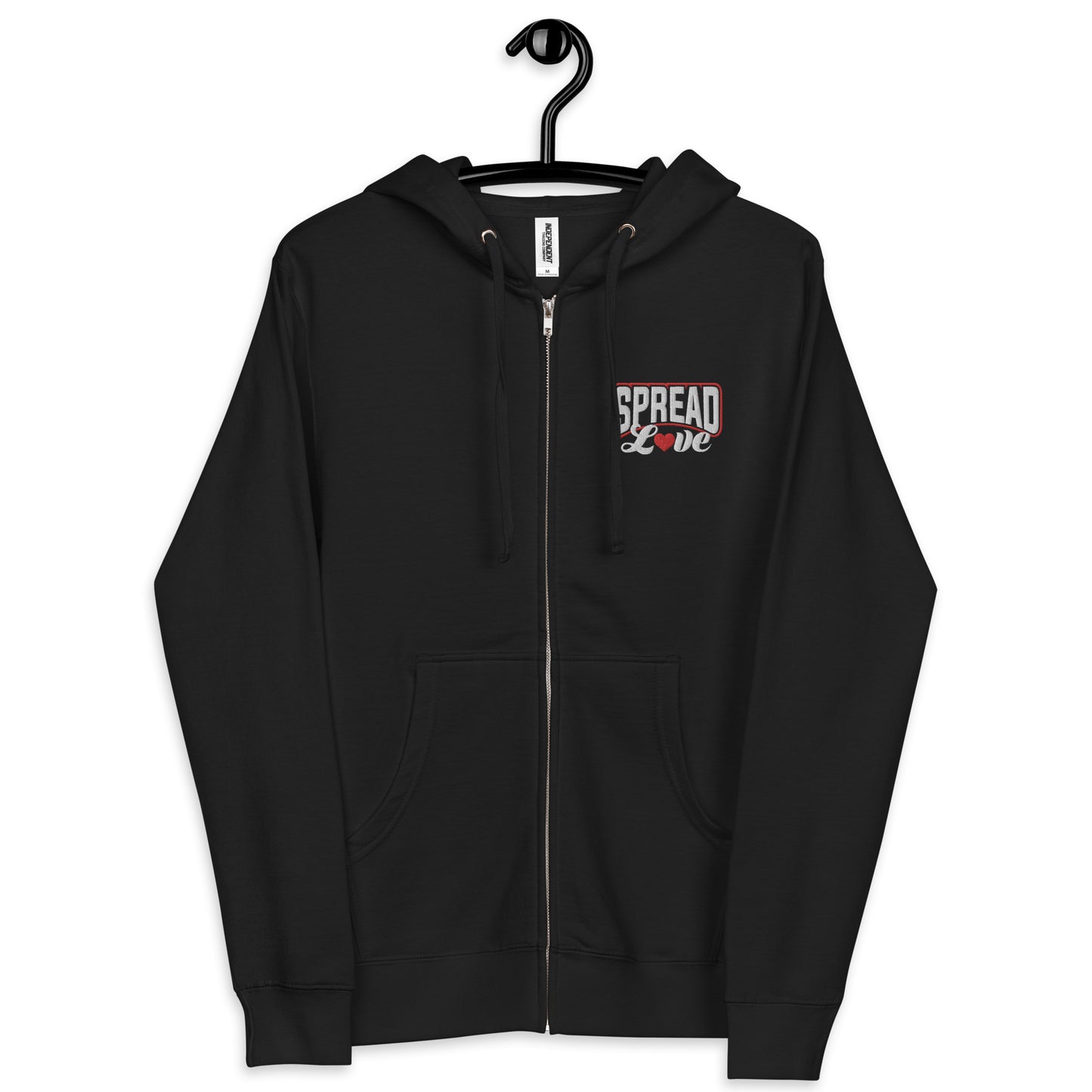A black fleece zip-up hoodie with 'SPREAD LOVE' text on the front in white with a red heart replacing the "o".