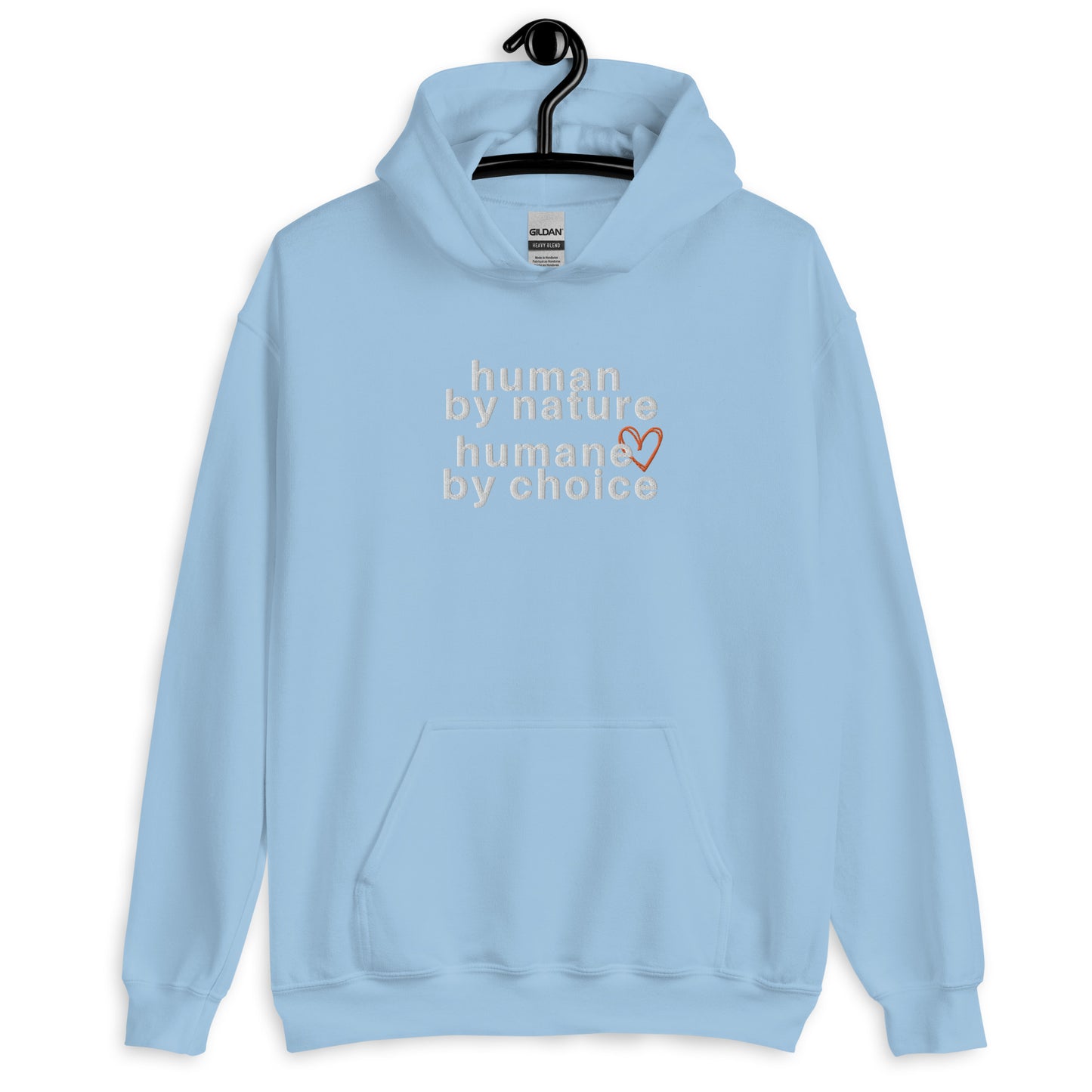 light blue hoodie with "Human by nature, humane by choice" graphic on front with red heart outline behind the "e" in humane