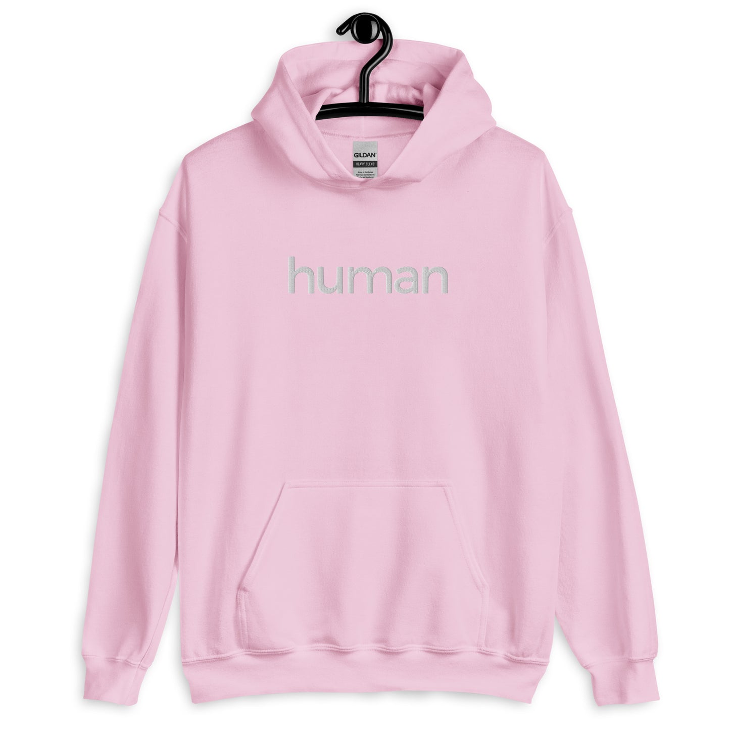 light pink hoodie with "human" printed on front in white