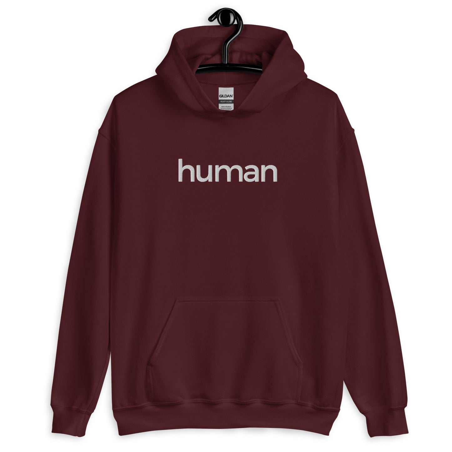 maroon hoodie with "human" printed on front in white