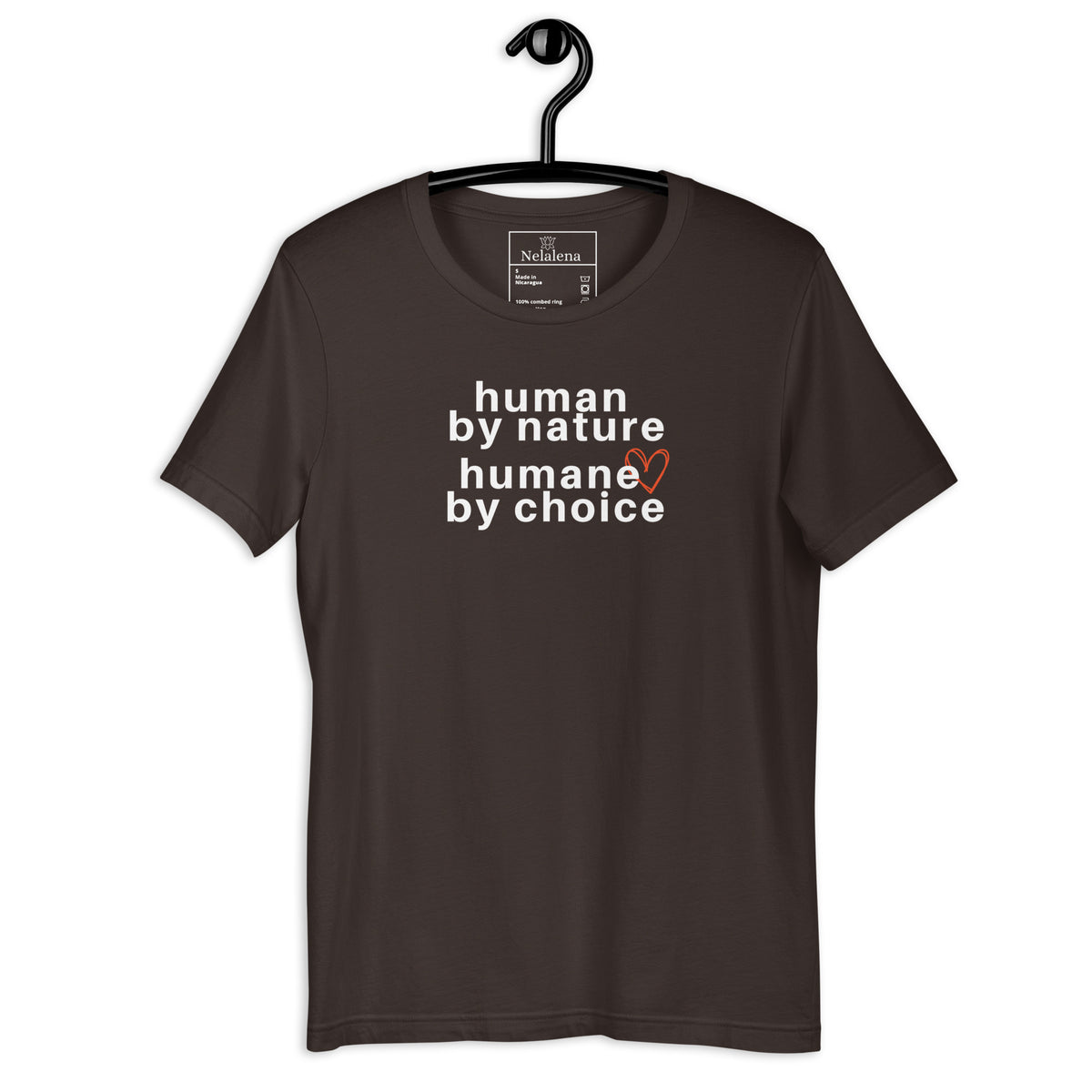 A brown short-sleeve t-shirt hanging on a black hanger against a white background, featuring the text 'human by nature humane by choice' in white with a small orange heart accent.