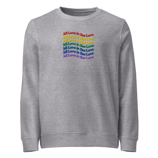 A heather gray crewneck sweatshirt featuring a stacked graphic text design on the chest that reads 'All Love is One Love' in a rainbow color gradient.