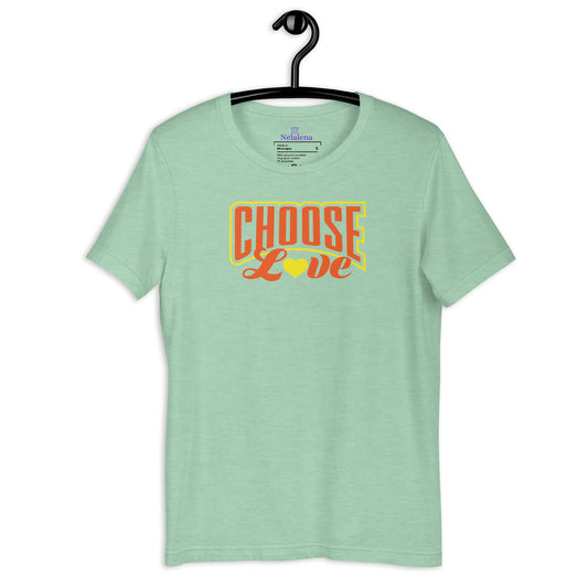 A mint green short-sleeve t-shirt hanging on a black hanger against a white background, featuring a retro-style graphic on the chest that reads 'CHOOSE Love' in orange and yellow.