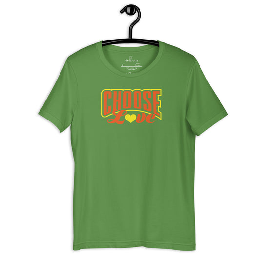 A leaf green short-sleeve t-shirt hanging on a black hanger against a white background, featuring a retro-style graphic on the chest that reads 'CHOOSE Love' in orange and yellow.