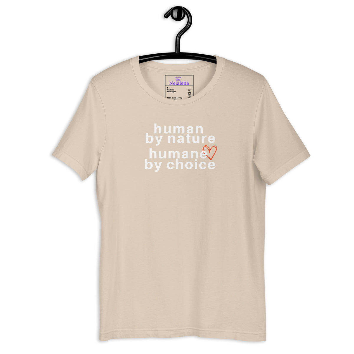 A beige short-sleeve t-shirt hanging on a black hanger against a white background, featuring the text 'human by nature humane by choice' in white with a small orange heart accent.
