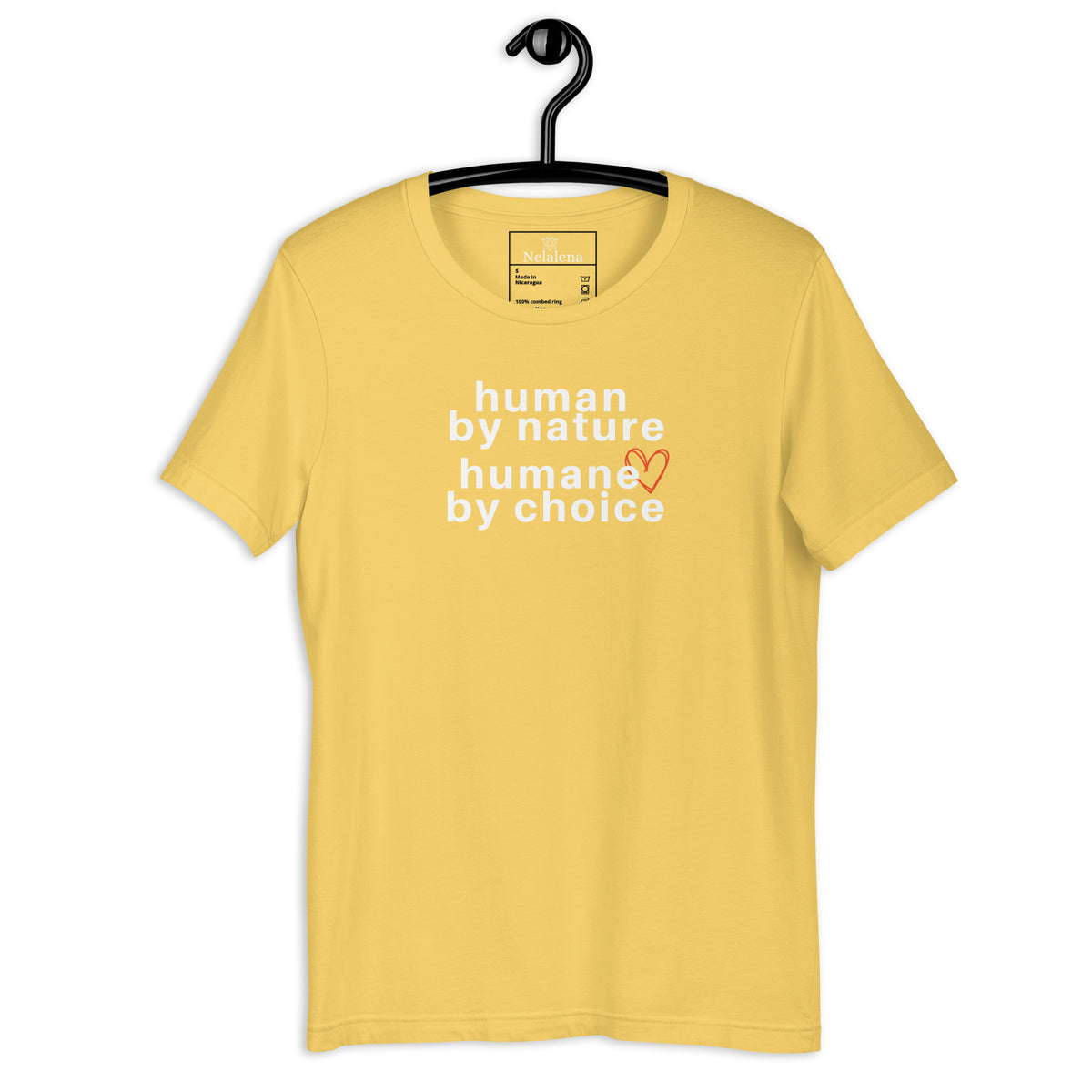A yellow short-sleeve t-shirt hanging on a black hanger against a white background, featuring the text 'human by nature humane by choice' in white with a small orange heart accent.