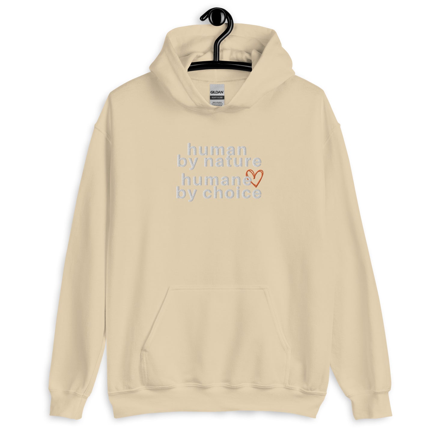 sand colored hoodie with "Human by nature, humane by choice" graphic on front with red heart outline behind the "e" in humane