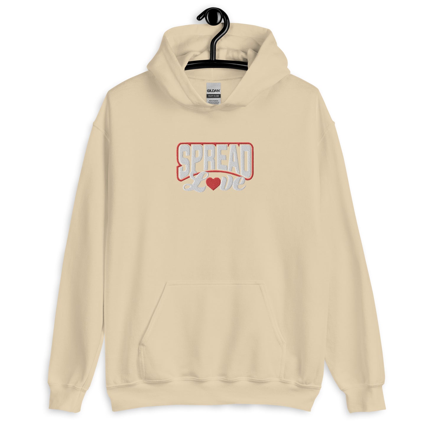 A sand colored hoodie with 'SPREAD LOVE' text in red and white with red heart symbol instead of the 'o' on the front.