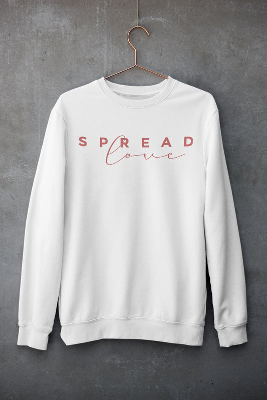 white nelalena spread love sweatshirt hanging against a gray wall