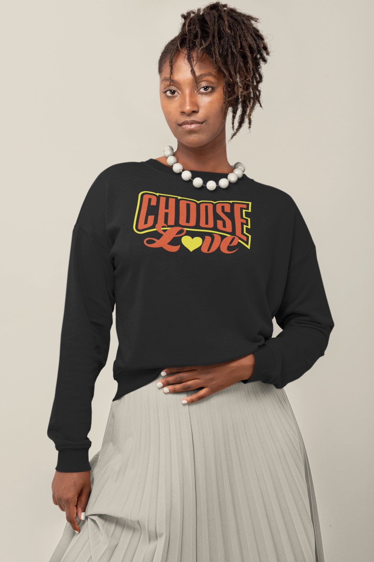 black woman with dreadlocks wearing black nelalena choose love sweatshirt